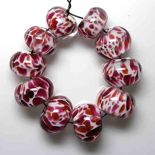 Set of 10 - Opaque white base and Autumn leaves frit, encased in clear for sparkle
