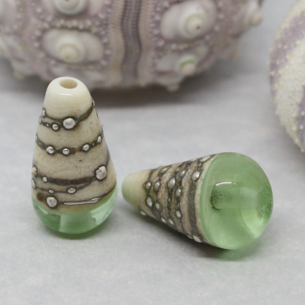 Pairs - Conical style beads combining ivory glass wrapped in fine silver, with luscious transparents - 012101R