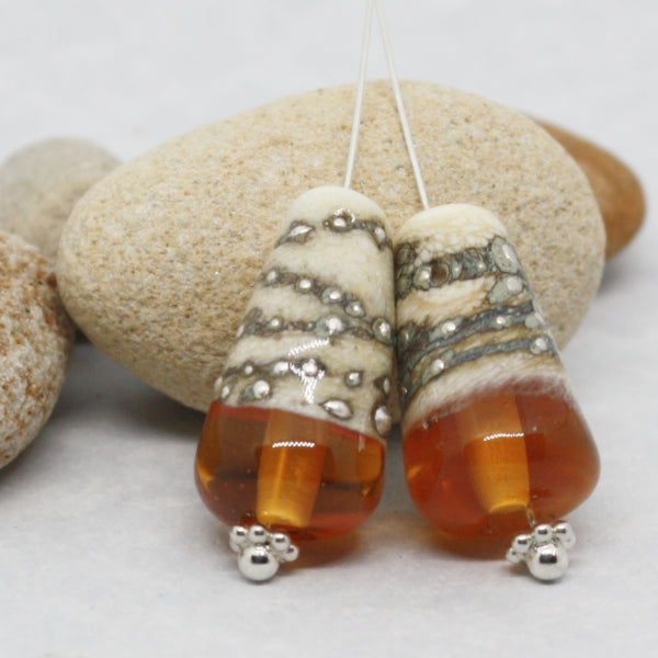 Pairs - Conical style beads combining ivory glass wrapped in fine silver, with luscious transparents - 012101R