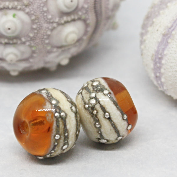 Pairs - Round beads combining ivory glass wrapped in fine silver at one end, with luscious transparents - 012102R