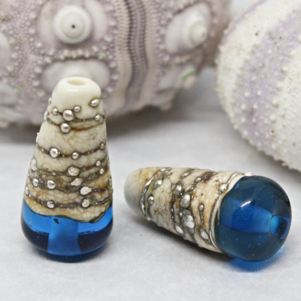 Pairs - Conical style beads combining ivory glass wrapped in fine silver, with luscious transparents - 012101R